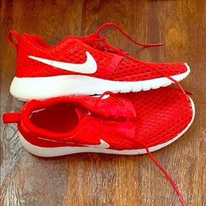 Red mesh Nike tennis shoes